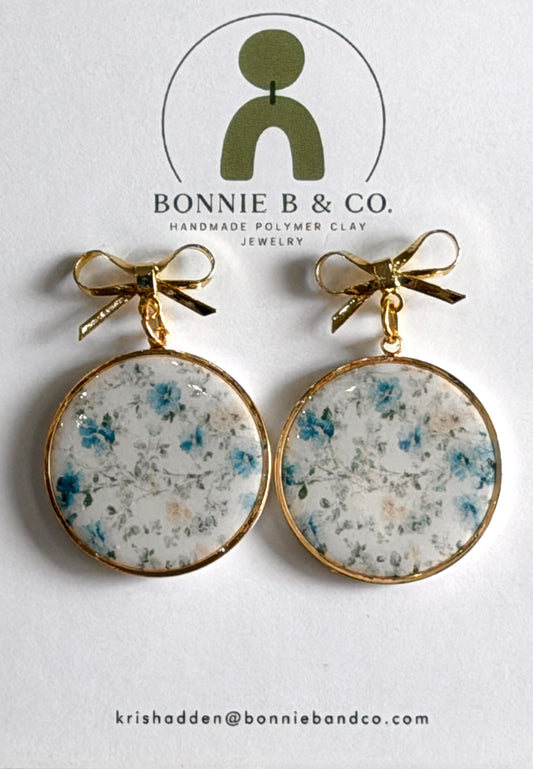 blue tea garden floral polymer clay earrings with gold bow dangles handmade lightweight jewelry