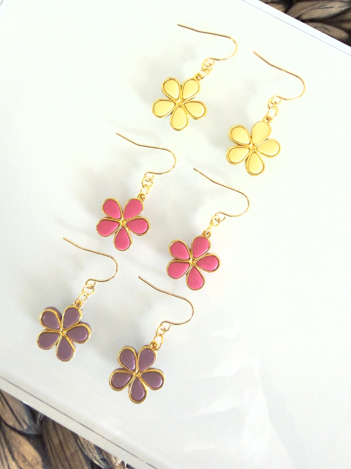 Lightweight daisy earrings with gold hooks
