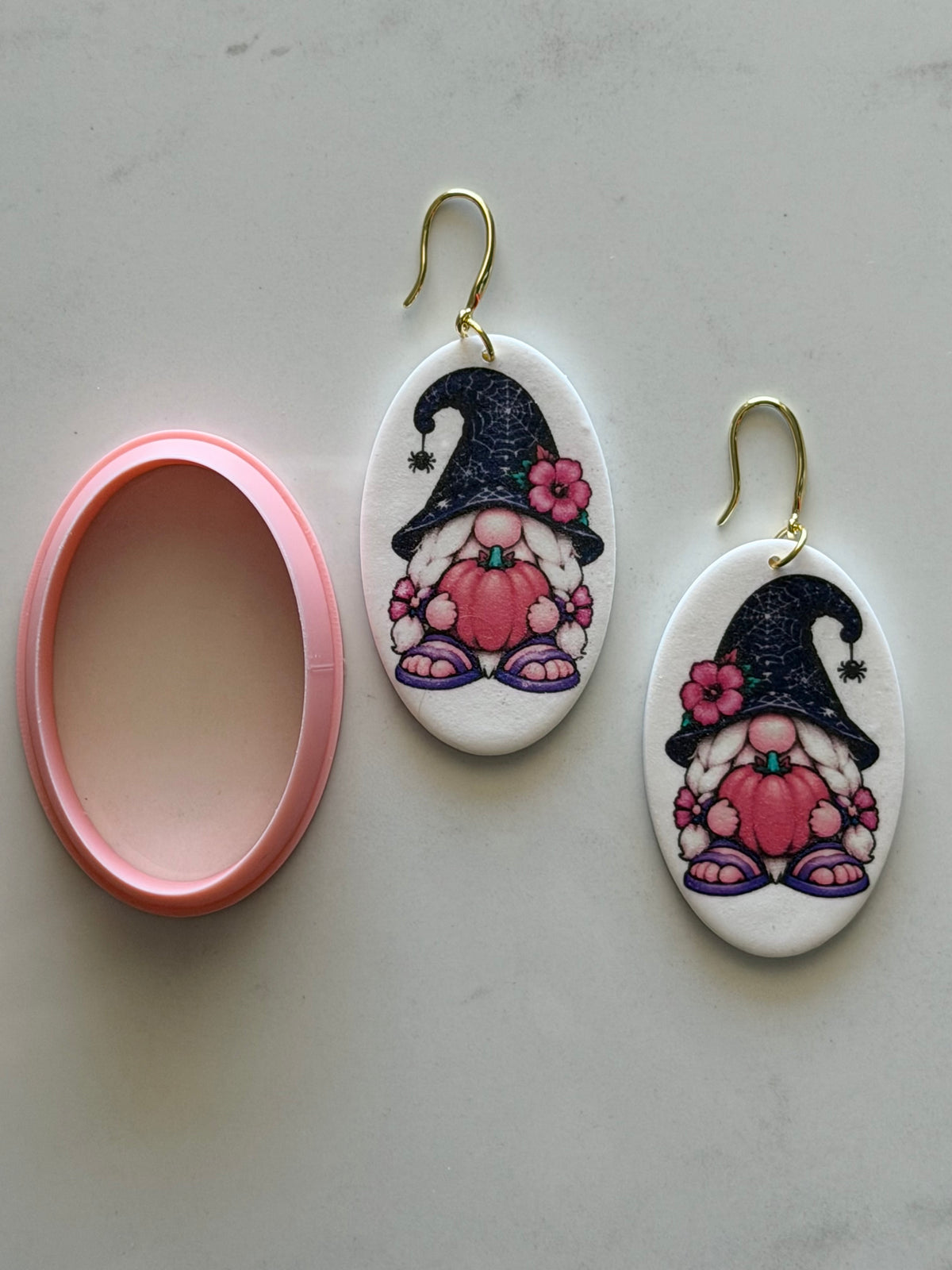 Halloween beach gnome polymer clay transfer sheet and matching pink oval cutter bundle for handmade earrings.